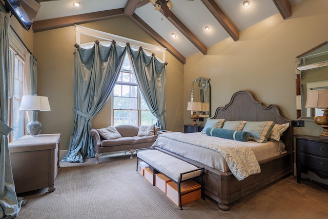 bedroom with carpet, vaulted ceiling with beams, and ceiling fan