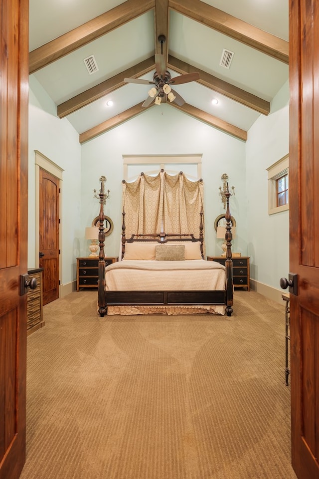 carpeted bedroom featuring vaulted ceiling with beams and ceiling fan