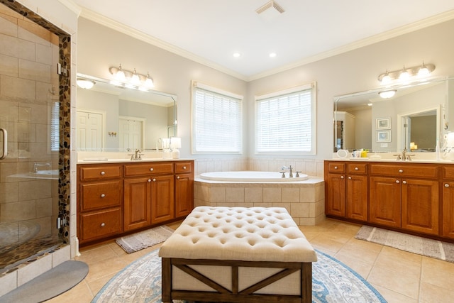 bathroom featuring ornamental molding, vanity, tile patterned floors, and plus walk in shower