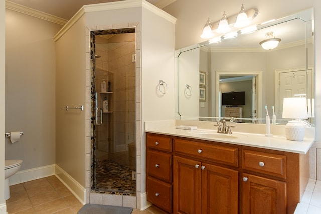 bathroom featuring toilet, a shower with shower door, ornamental molding, vanity, and tile patterned flooring