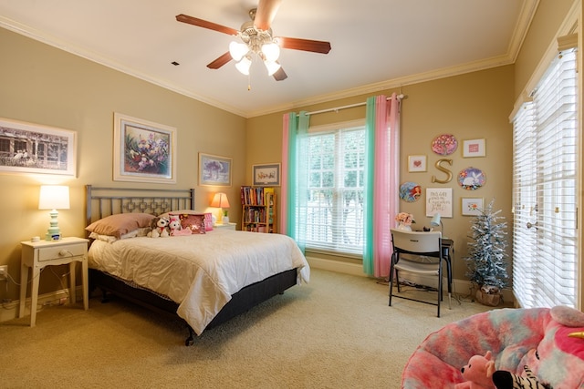 bedroom with light colored carpet, crown molding, ceiling fan, and baseboards