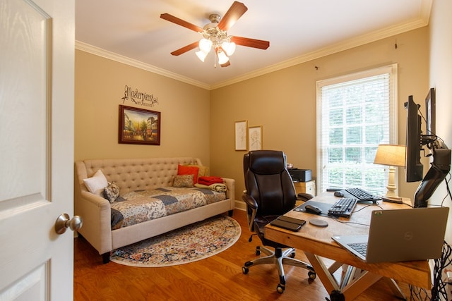 home office featuring baseboards, ornamental molding, wood finished floors, and a ceiling fan