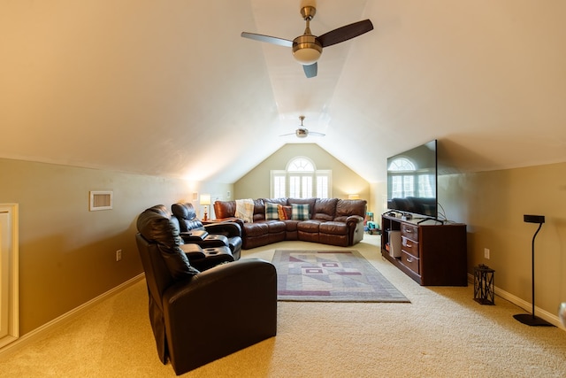 living room featuring ceiling fan, lofted ceiling, and light carpet