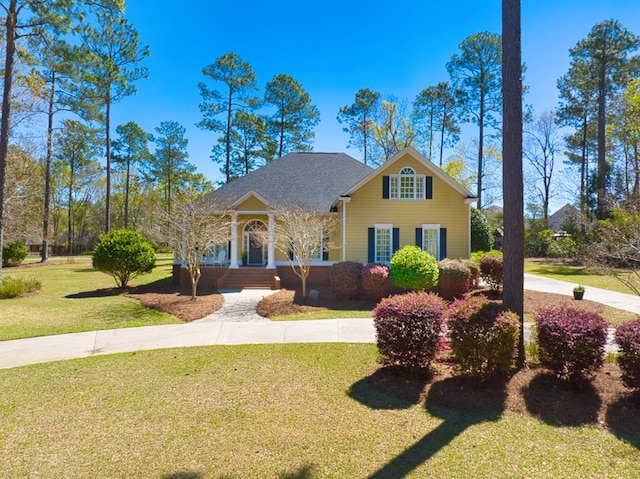 view of front of home with a front lawn