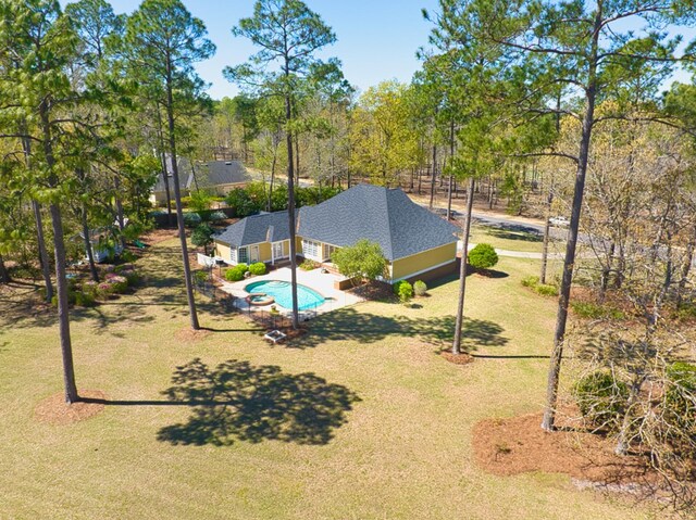 view of community with a yard