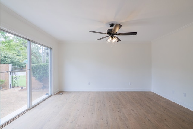 unfurnished room with light wood-type flooring, ceiling fan, and crown molding