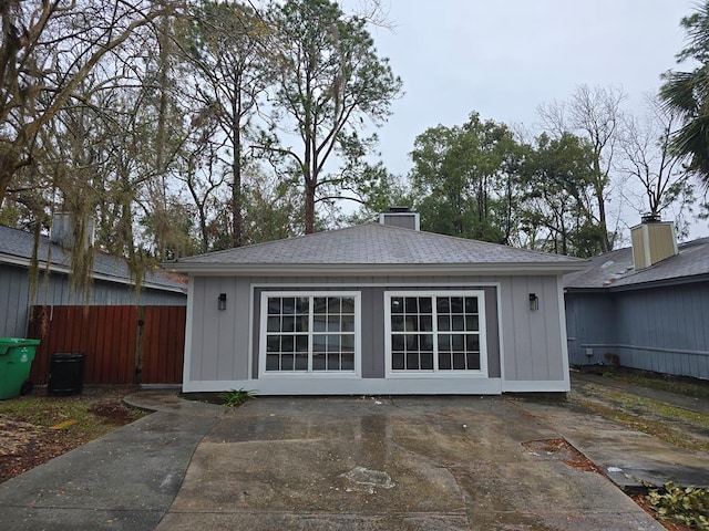 rear view of property featuring a patio