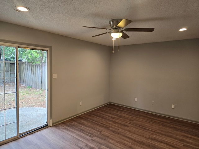 unfurnished room with ceiling fan, a textured ceiling, and hardwood / wood-style flooring