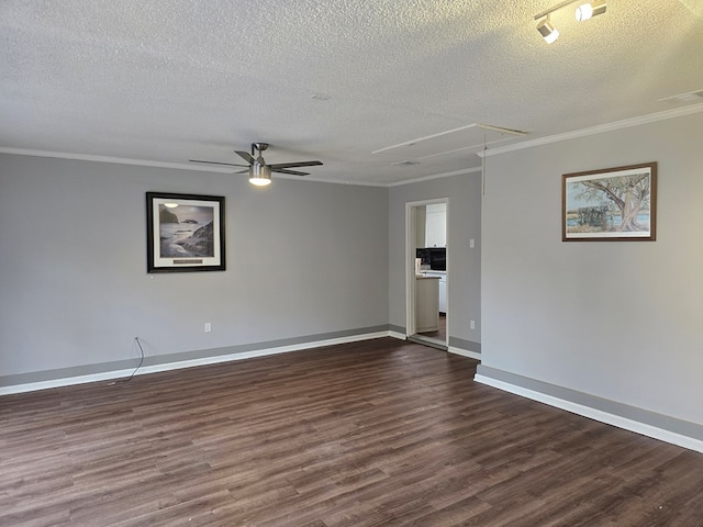 empty room featuring a textured ceiling, ceiling fan, ornamental molding, and dark wood-type flooring