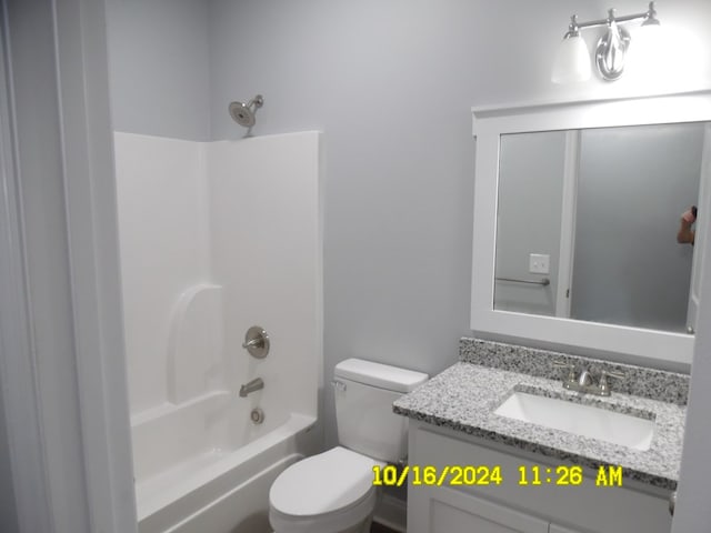 full bathroom featuring vanity, shower / bathtub combination, and toilet