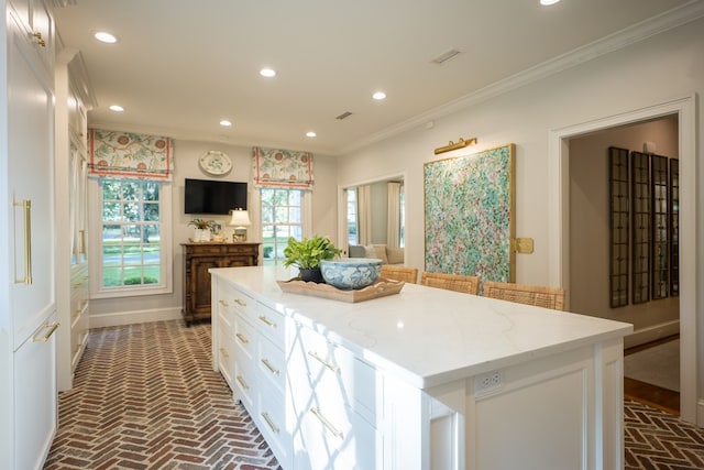 793 Lake Laurie Dr, Valdosta, GA 31605 - kitchen featuring white cabinetry, brick floor, crown molding, and recessed lighting