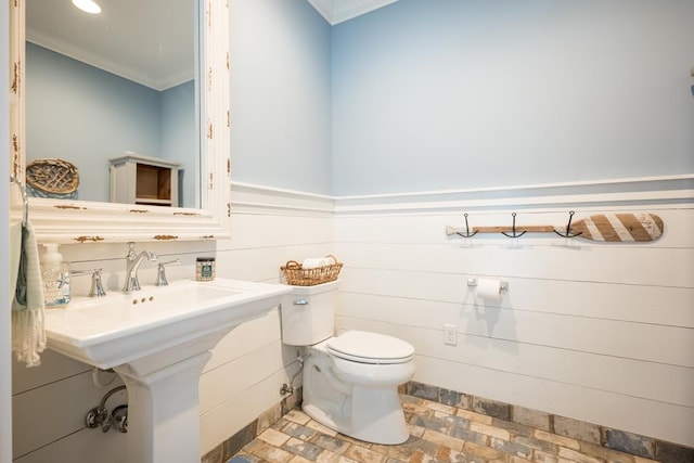 793 Lake Laurie Dr, Valdosta, GA 31605 - half bathroom with toilet, a sink, and crown molding