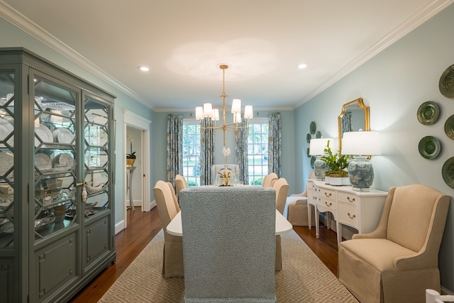 793 Lake Laurie Dr, Valdosta, GA 31605 - dining area featuring dark wood-type flooring, ornamental molding, recessed lighting, and a notable chandelier