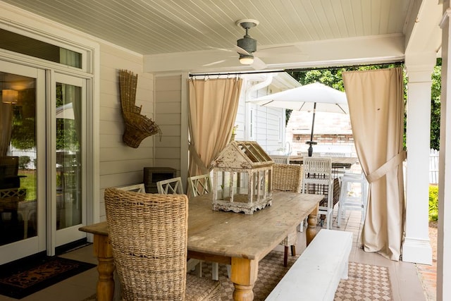 793 Lake Laurie Dr, Valdosta, GA 31605 - dining area with wooden ceiling, wood walls, and a ceiling fan