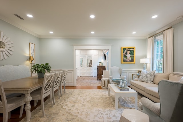 793 Lake Laurie Dr, Valdosta, GA 31605 - living area featuring a wainscoted wall, visible vents, ornamental molding, recessed lighting, and light wood-type flooring