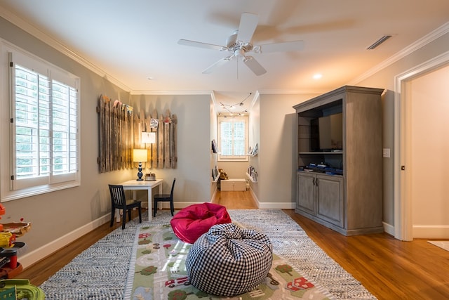 793 Lake Laurie Dr, Valdosta, GA 31605 - sitting room featuring wood finished floors, ornamental molding, baseboards, and visible vents