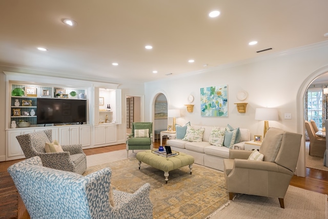 793 Lake Laurie Dr, Valdosta, GA 31605 - living area with visible vents, crown molding, recessed lighting, arched walkways, and light wood-type flooring