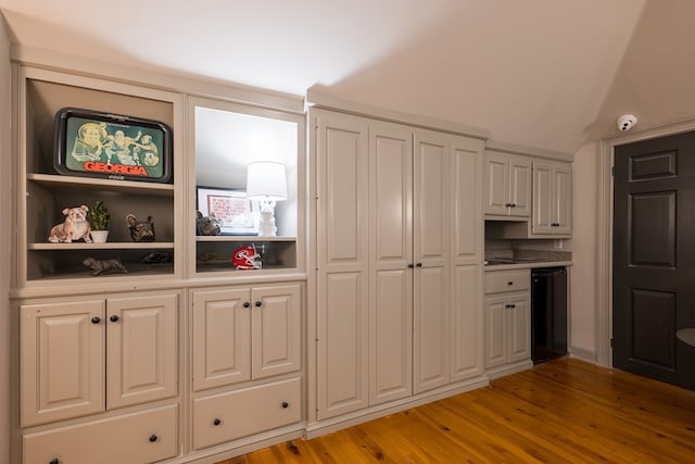 793 Lake Laurie Dr, Valdosta, GA 31605 - kitchen featuring light wood finished floors and white cabinets