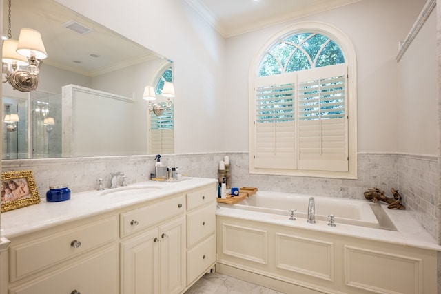 793 Lake Laurie Dr, Valdosta, GA 31605 - full bath with crown molding, vanity, a garden tub, marble finish floor, and visible vents