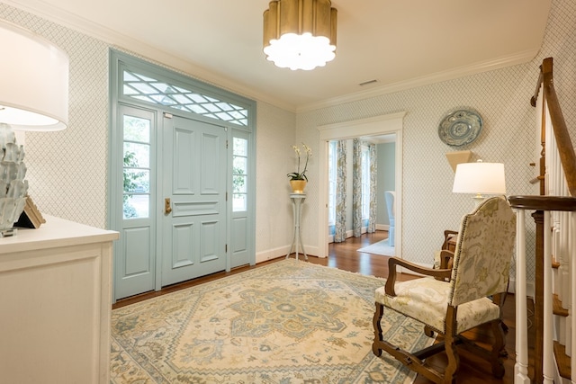 793 Lake Laurie Dr, Valdosta, GA 31605 - entrance foyer featuring visible vents, crown molding, baseboards, wallpapered walls, and wood finished floors