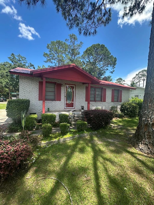 1325 Wesley Ln, Valdosta, GA 31601 - single story home featuring brick siding and a front yard