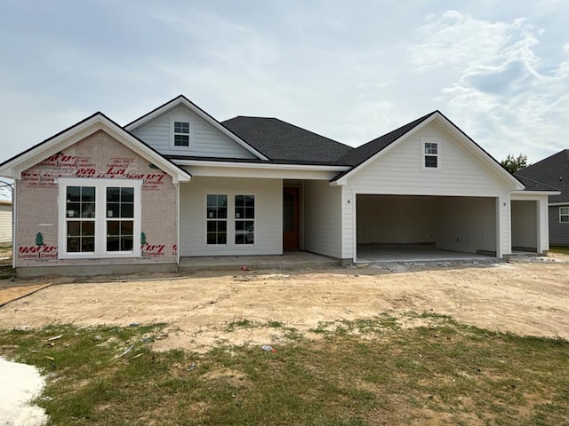 144 Audrey Ln, Hahira, GA 31632 - view of front facade with a garage