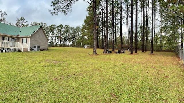 view of yard with a deck