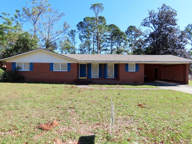 ranch-style house featuring a carport and a front yard