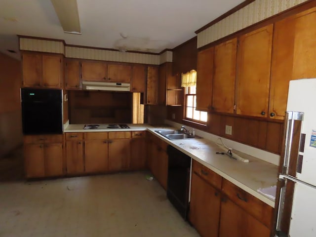 kitchen featuring sink and black appliances