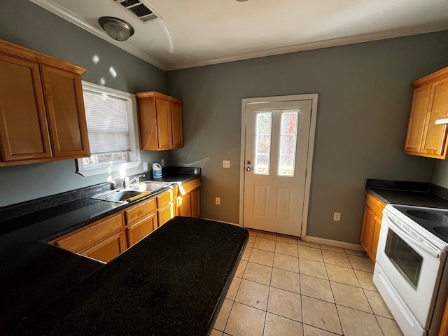 kitchen with light tile patterned floors, ornamental molding, electric range, and sink