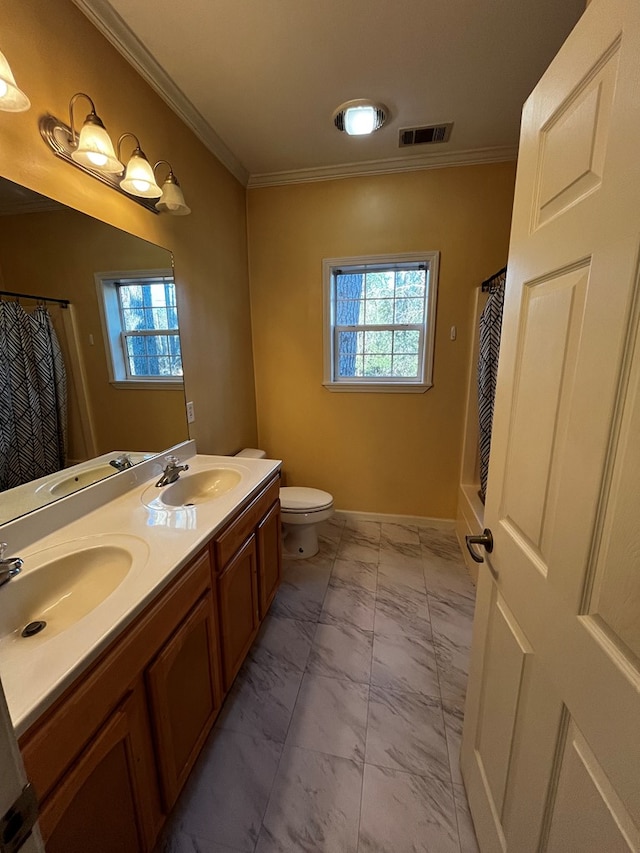 bathroom with toilet, crown molding, walk in shower, and vanity