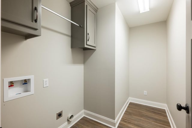 laundry room featuring cabinet space, baseboards, dark wood-type flooring, hookup for an electric dryer, and washer hookup