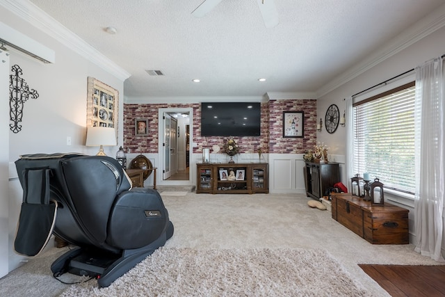 carpeted living room with crown molding and a textured ceiling