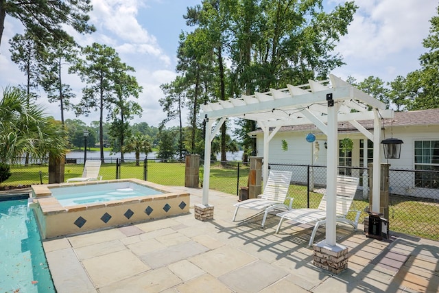 view of patio featuring a pool with hot tub and a pergola