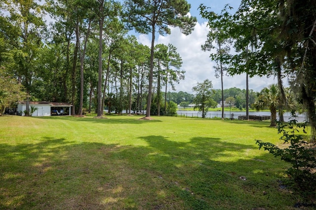 view of yard with a water view