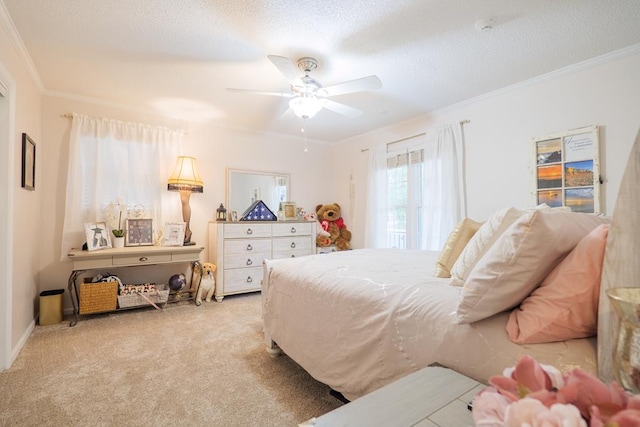 bedroom with ceiling fan, light colored carpet, ornamental molding, and a textured ceiling