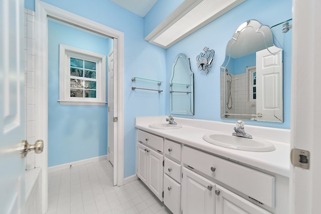 bathroom featuring vanity and tile patterned flooring