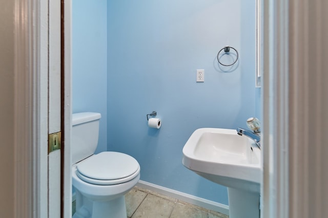 bathroom with sink and toilet