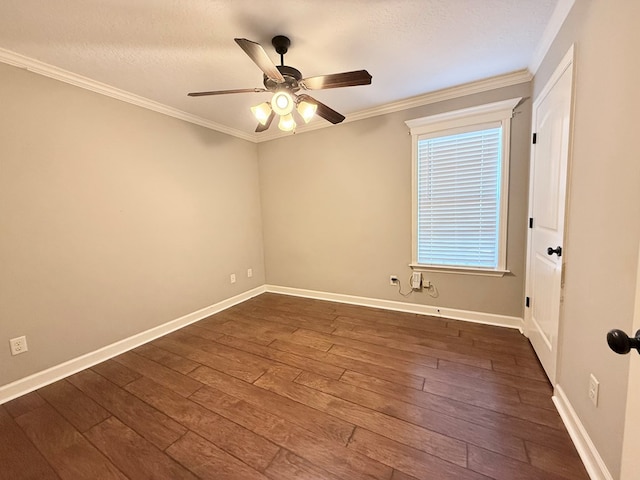 spare room featuring a textured ceiling, ceiling fan, ornamental molding, and dark hardwood / wood-style floors