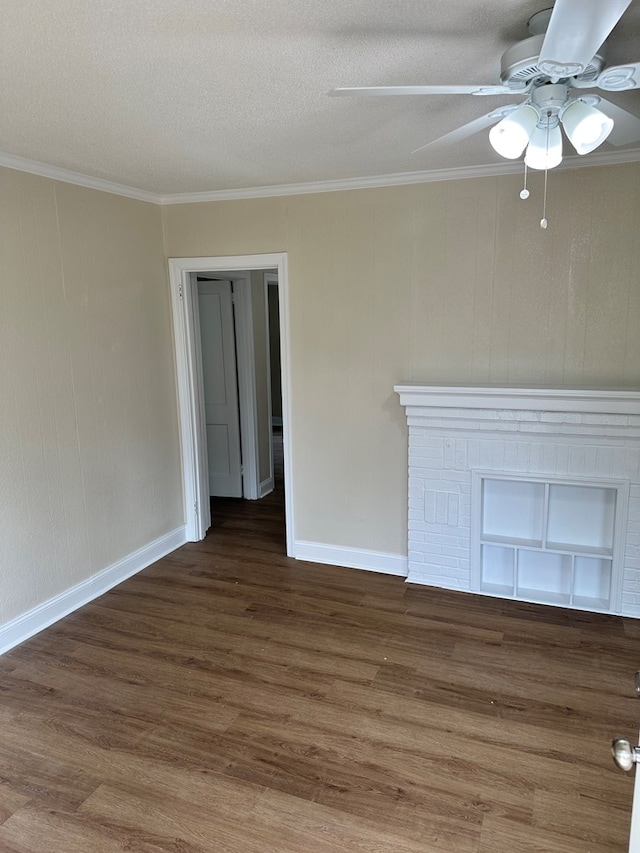 interior space featuring hardwood / wood-style flooring, ceiling fan, crown molding, and a textured ceiling