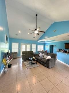 tiled living area with high vaulted ceiling, a ceiling fan, and a wealth of natural light