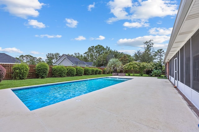 1166 Old Meadow Rd, Valdosta, GA 31605 - view of swimming pool featuring a sunroom, a fenced backyard, and a patio