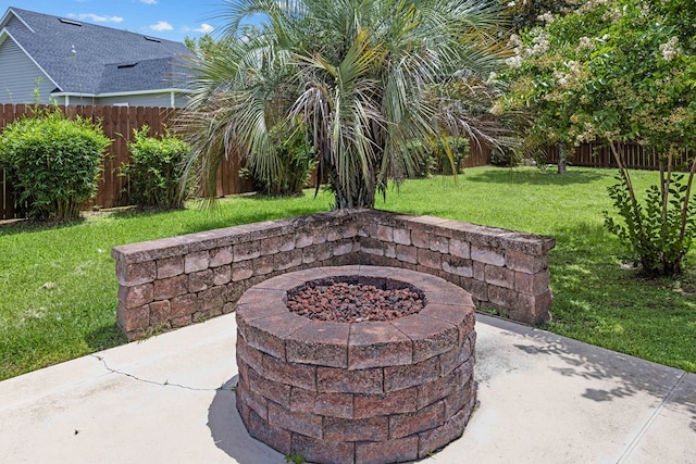 1166 Old Meadow Rd, Valdosta, GA 31605 - fenced backyard with an outdoor fire pit and a patio