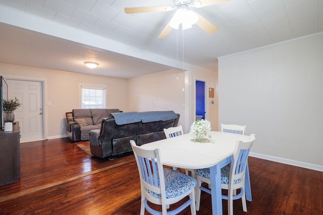 dining area with dark hardwood / wood-style floors and ceiling fan