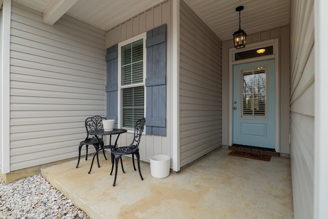 doorway to property with a porch