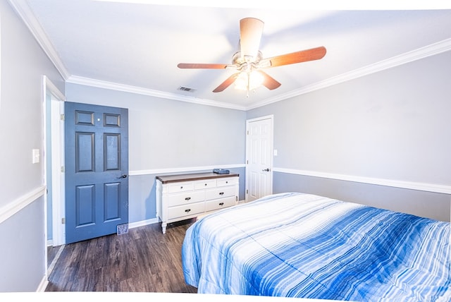 bedroom with dark wood-type flooring, ceiling fan, and ornamental molding