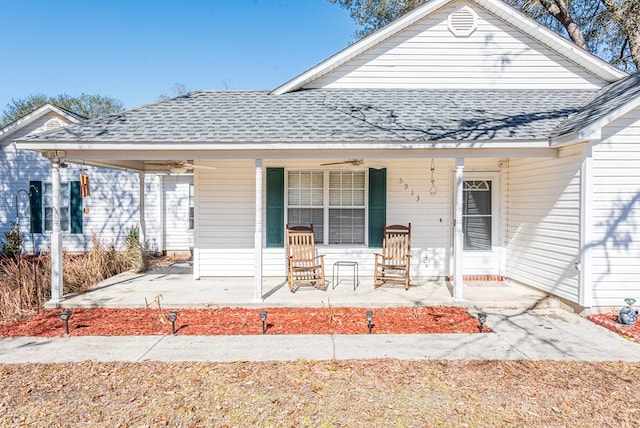 view of front of property featuring ceiling fan and a porch