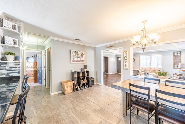 dining area featuring a notable chandelier and crown molding