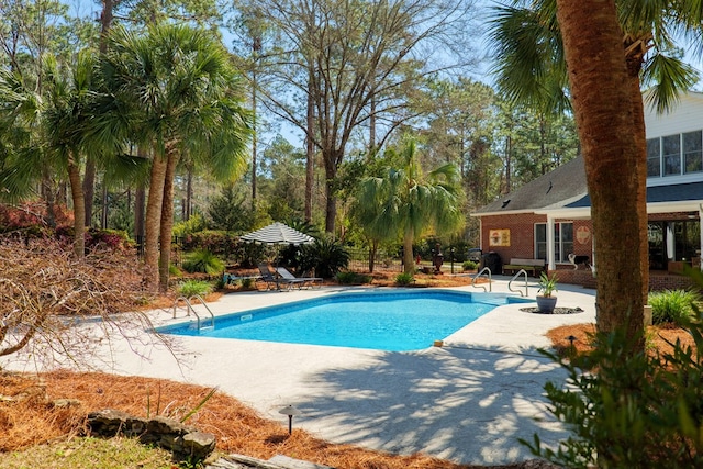 pool with a patio