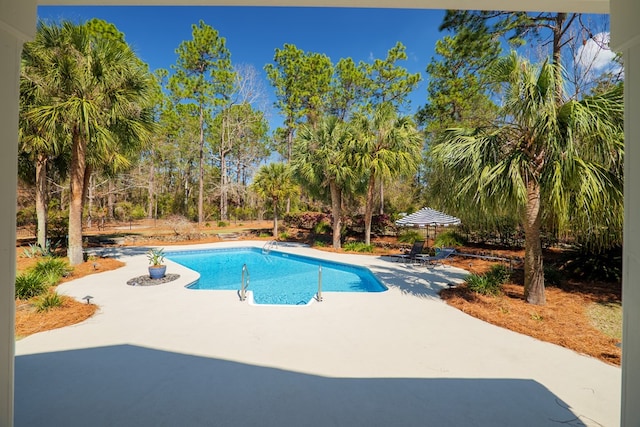 pool with a patio